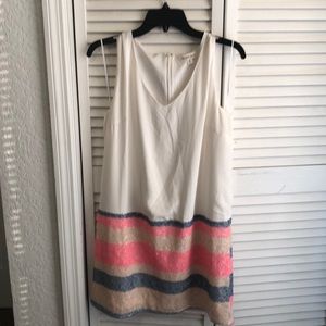 White dress with blue, tan & pink stripes